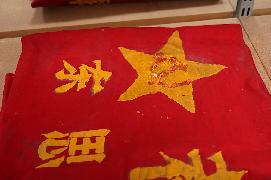 A Chinese Cultural Revolution flag, three armbands, a red book, a badge and a small flag-85cm wide x 102cm long